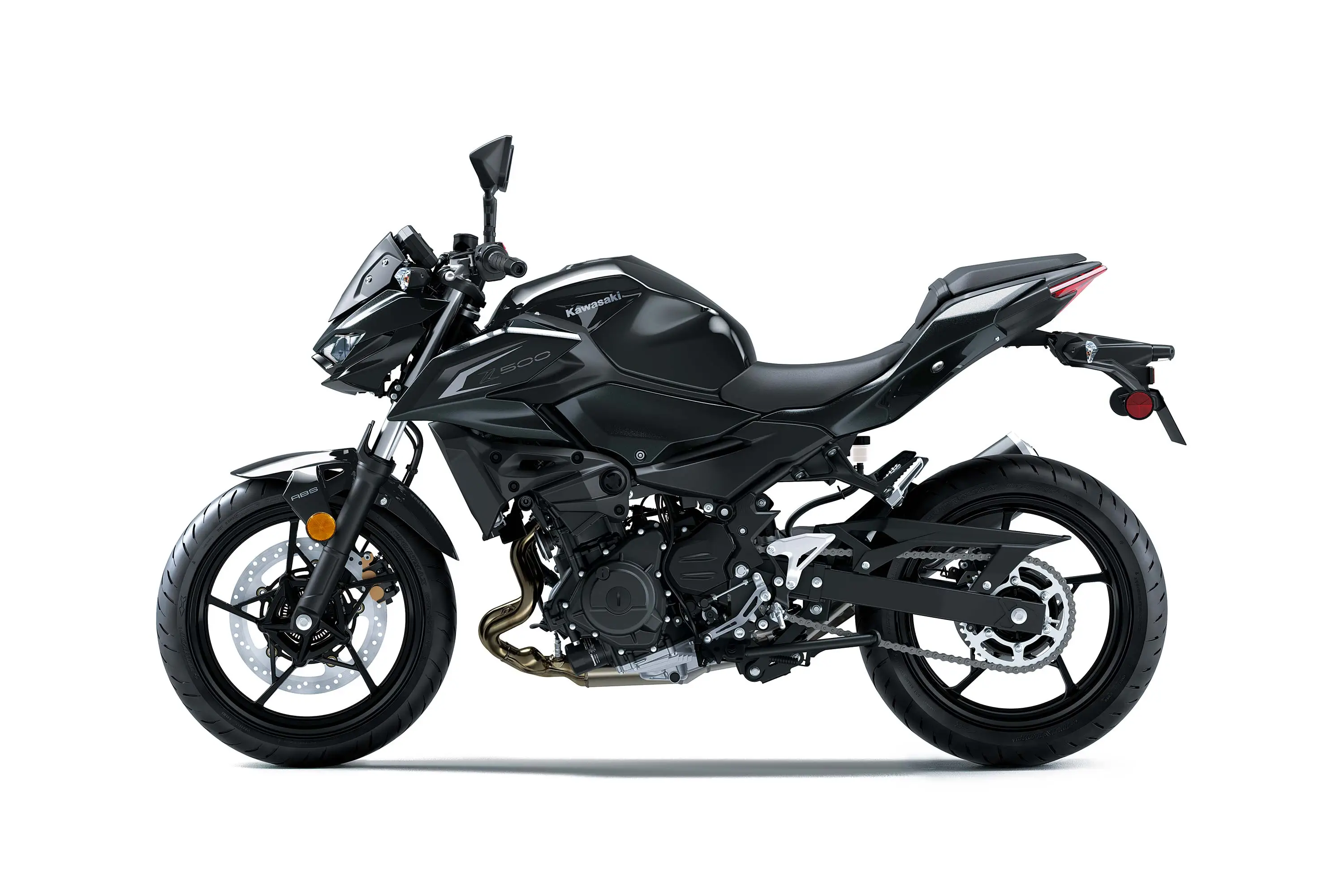Profile angle of a motorcycle staged in a white studio background.