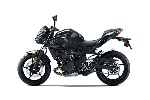 Profile angle of a motorcycle staged in a white studio background. opens in a new window
