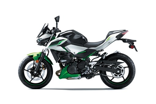 Profile angle of a motorcycle staged in a white studio background. opens in a new window