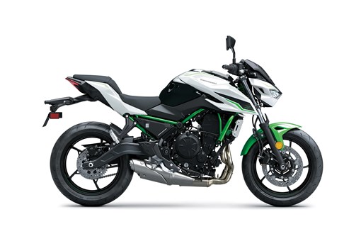 Profile angle of a motorcycle staged in a white studio background. opens in a new window