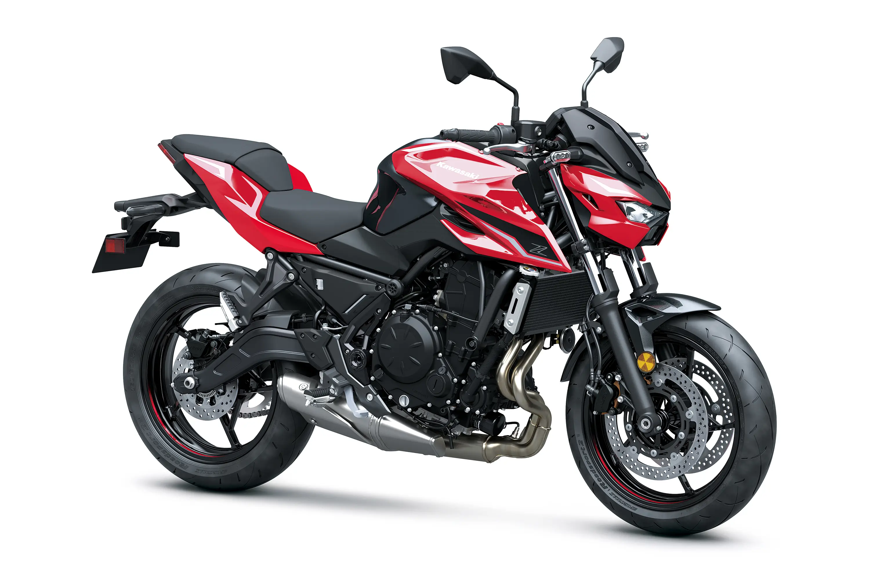 Three-quarter front angle of a red motorcycle staged in a white studio background.