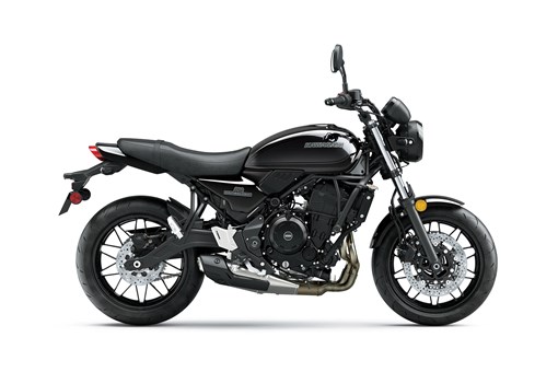 Side angle of a motorcycle staged in a white studio background. opens in a new window
