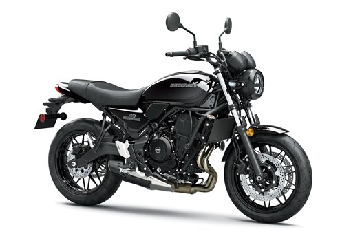 Three-quarter front angle of a motorcycle staged in a white studio background. opens in a new window