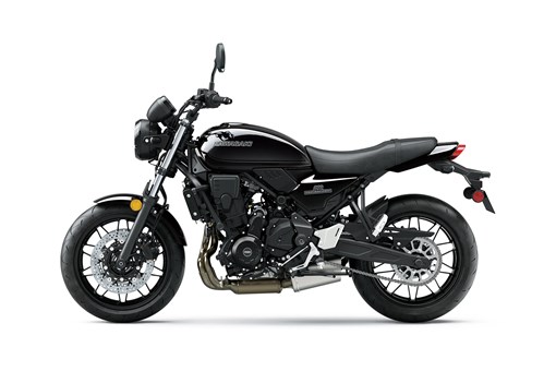 Profile angle of a motorcycle staged in a white studio background. opens in a new window