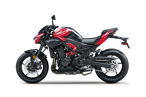 Profile angle of a motorcycle staged in a white studio background. opens in a new window