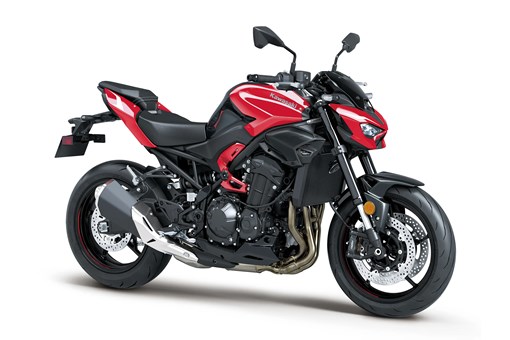 Three-quarter front angle of a motorcycle staged in a white studio background. opens in a new window