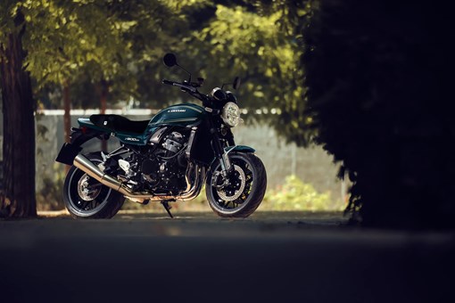 Side angle of a motorcycle staged on a road. opens in a new window