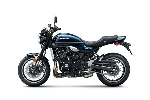 Profile angle of a motorcycle staged in a white studio background. opens in a new window