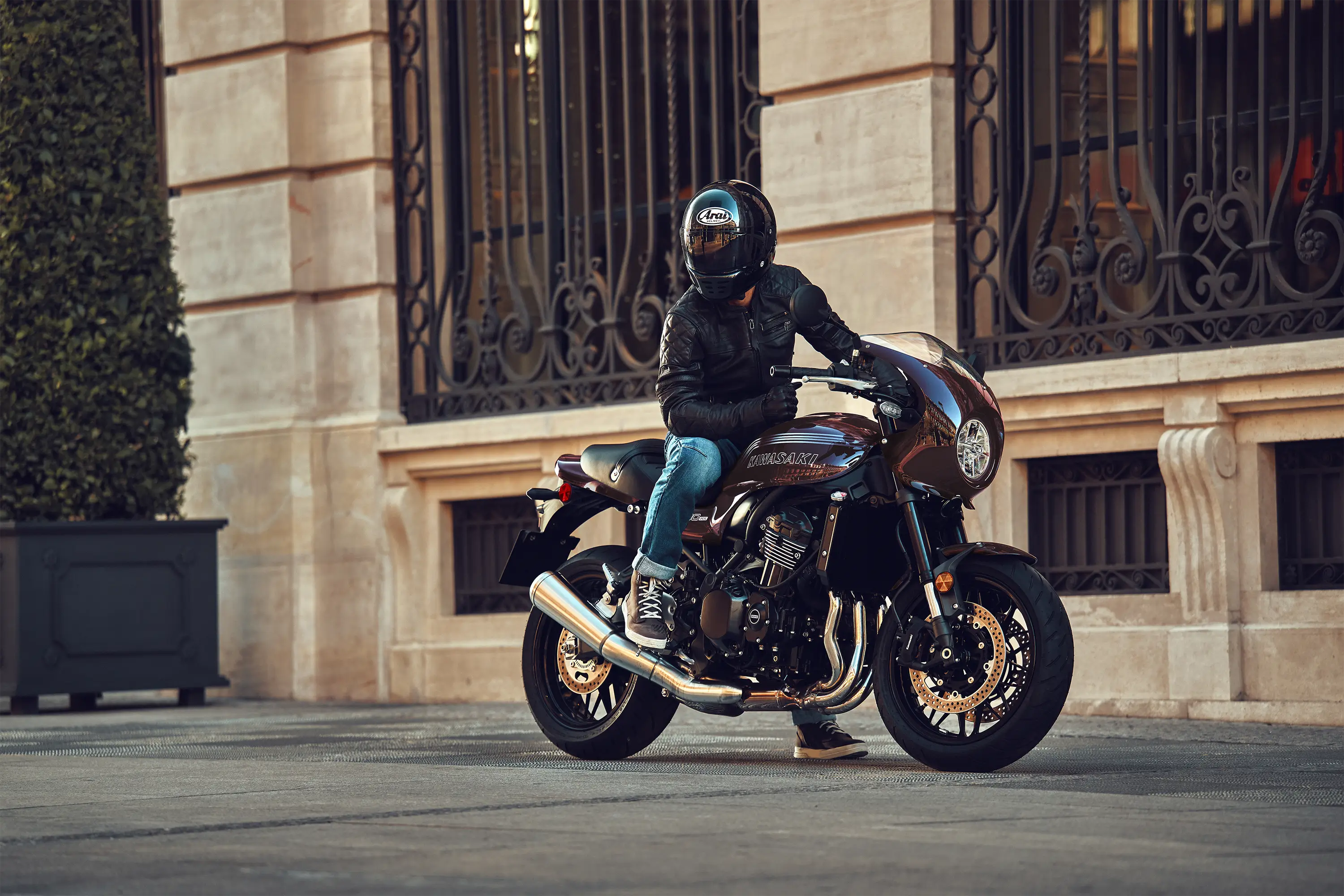 Three-quarter rear angle of a motorcycle parked.