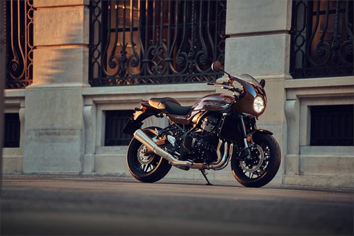 Profile angle of a motorcycle staged on a city sidewalk. opens in a new window