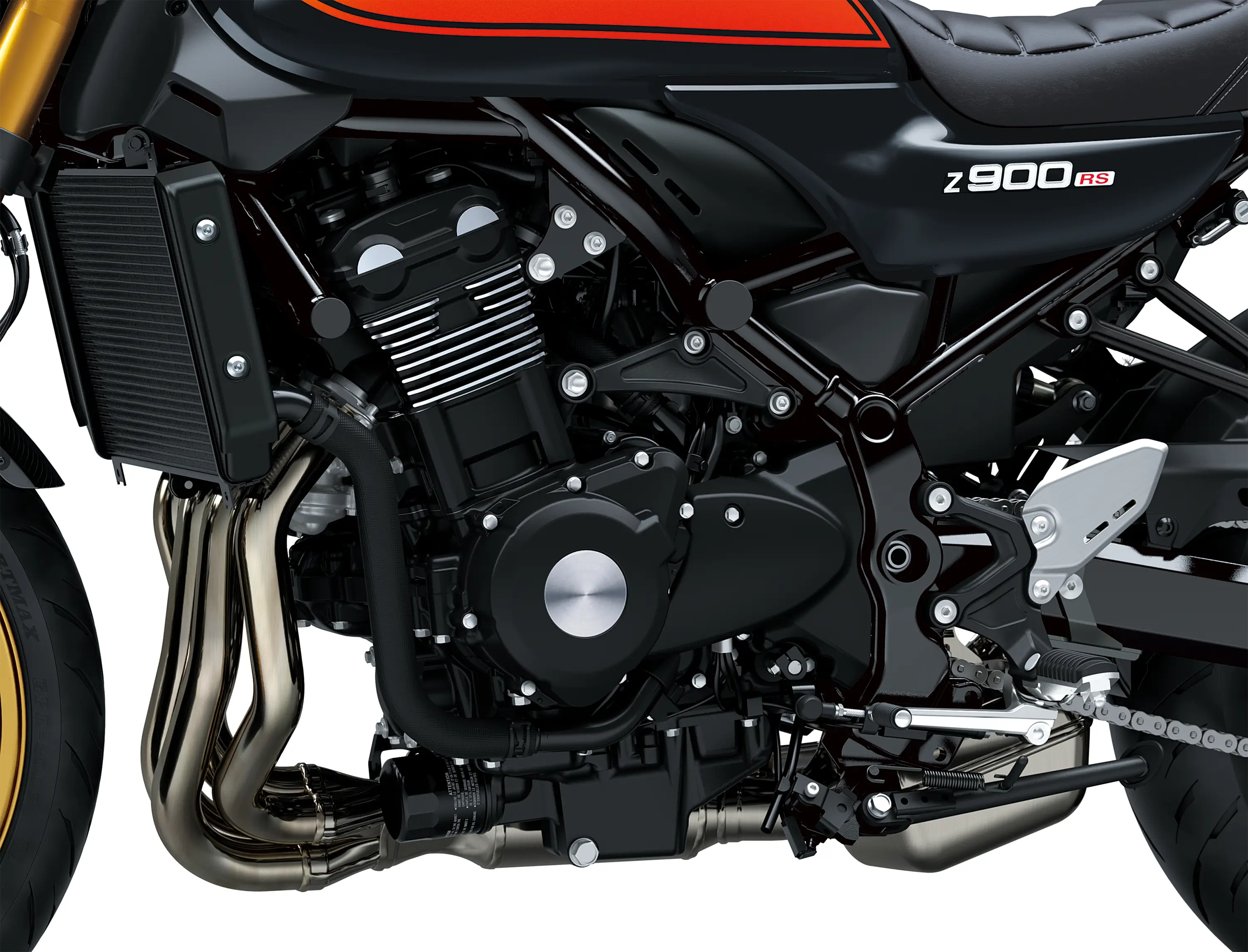 Close-up of the engine bay of a motorcycle staged in a white studio background.
