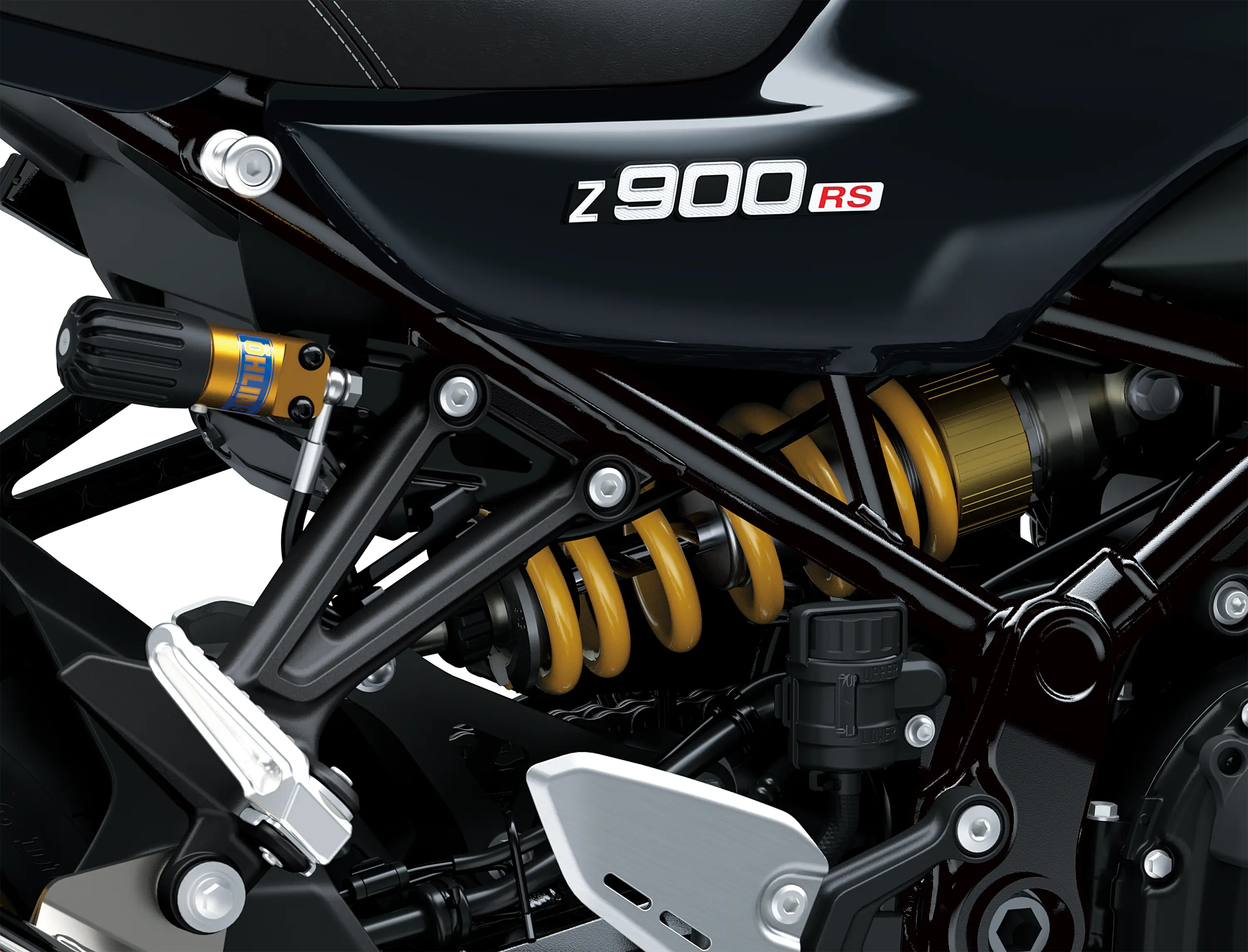 Close-up of the suspension a motorcycle staged in a white studio background.