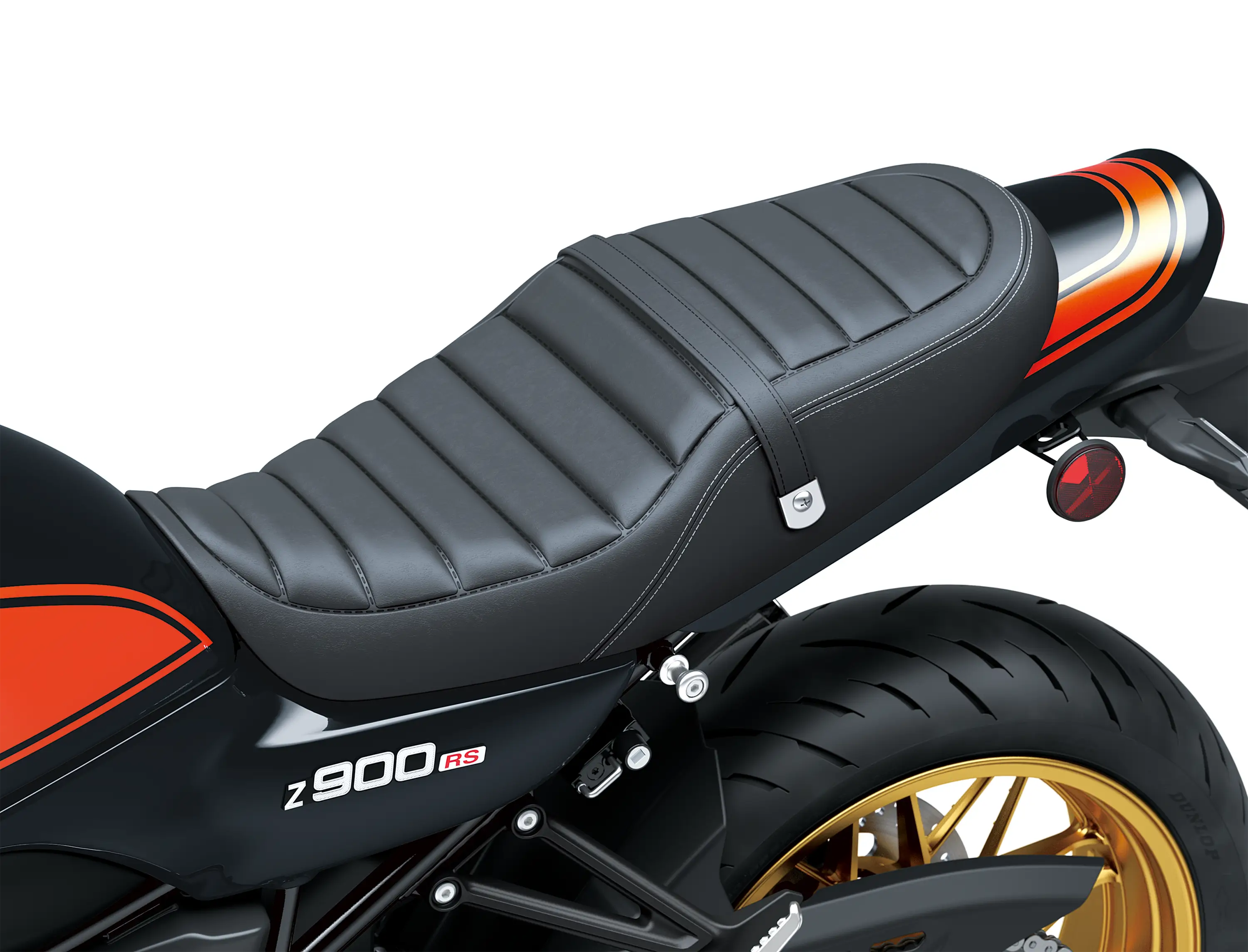 Close-up of the seat of a motorcycle staged in a white studio background.