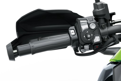 Left handlebar of a motorcycle staged in a white studio background. opens in a new window