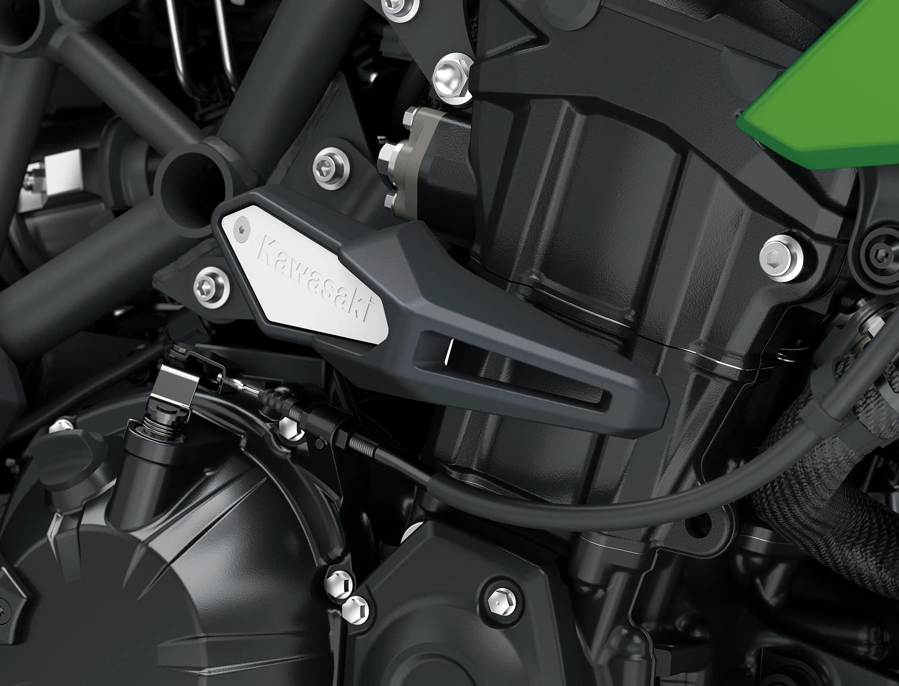 Side engine detail of a motorcycle staged in a white studio background.