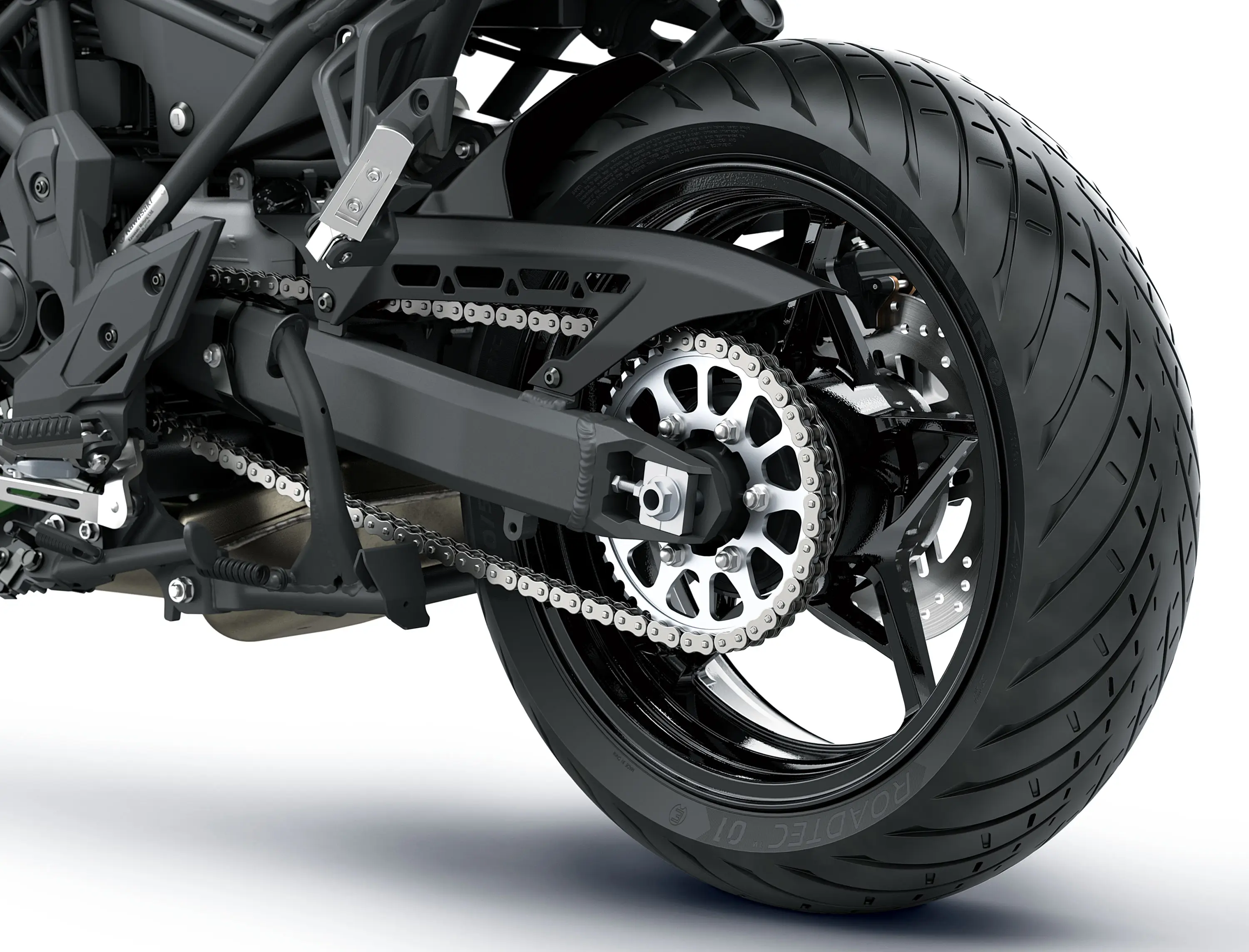 Rear wheel of a motorcycle staged in a white studio background.