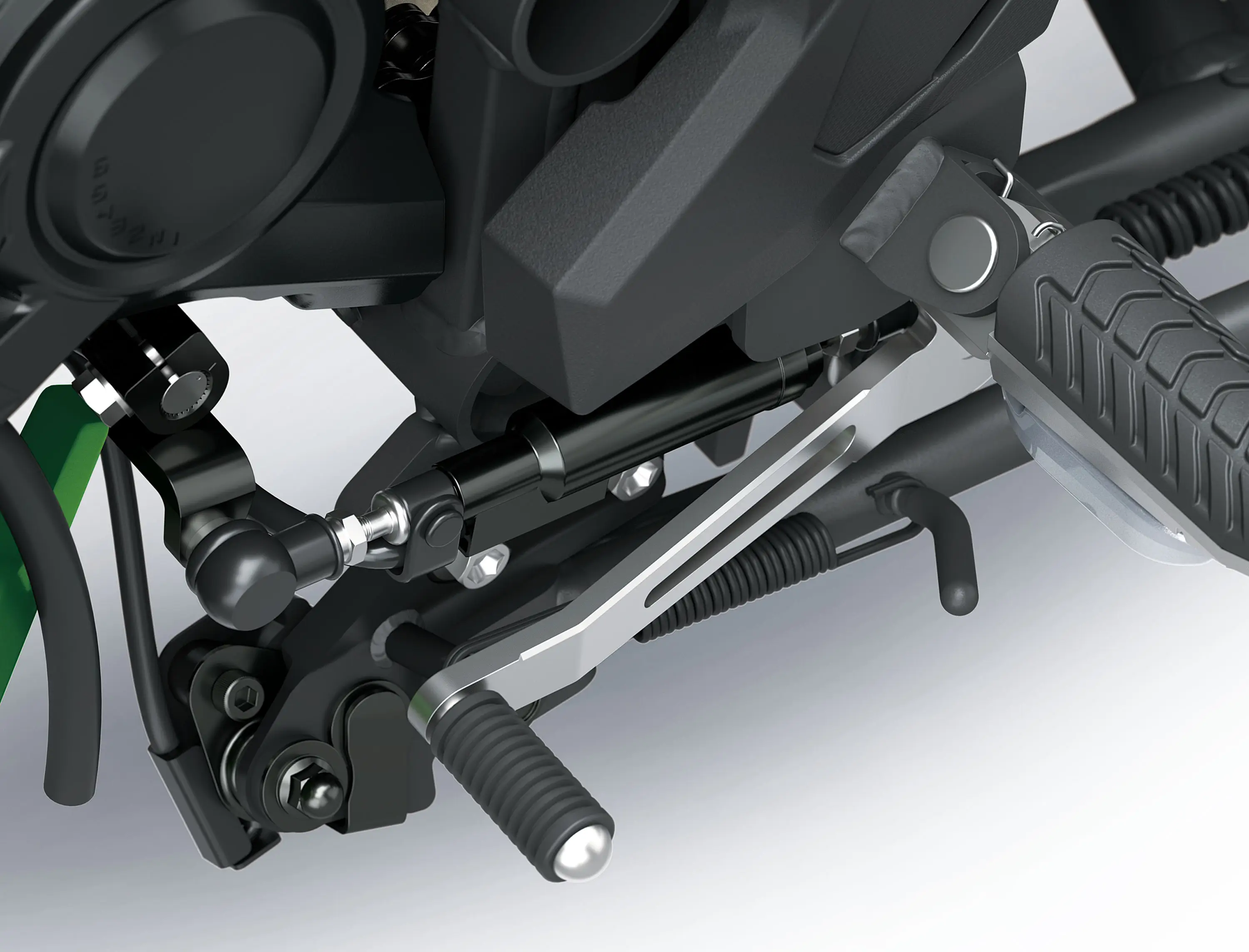 Detail of a motorcycle staged in a white studio background.