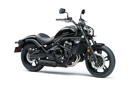 Front three-quarter angle of a black motorcycle staged in a white studio background. opens in a new window