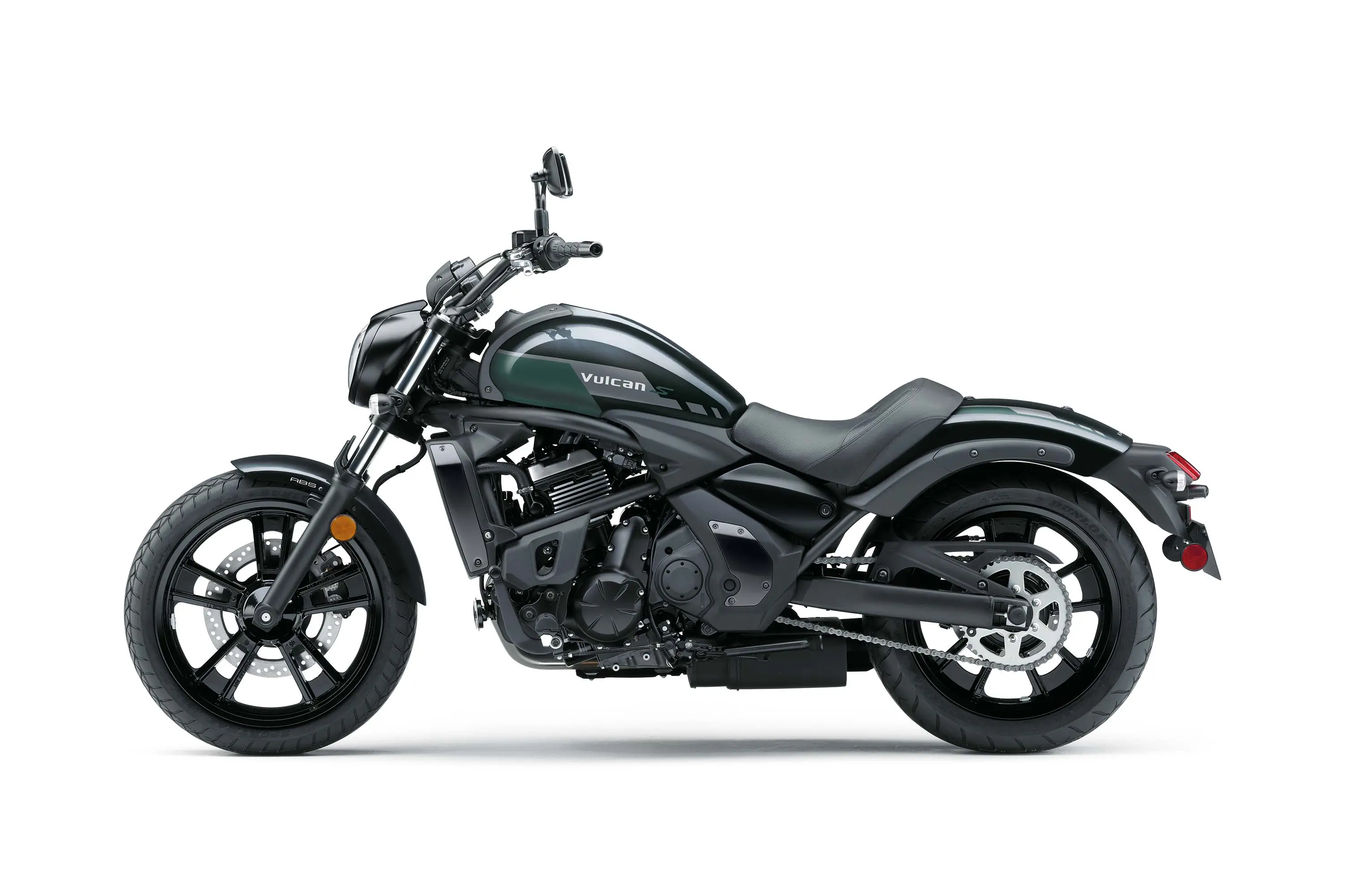 Profile angle of a motorcycle staged in a white studio background.