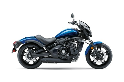 Side angle of a motorcycle staged in a white studio background. opens in a new window