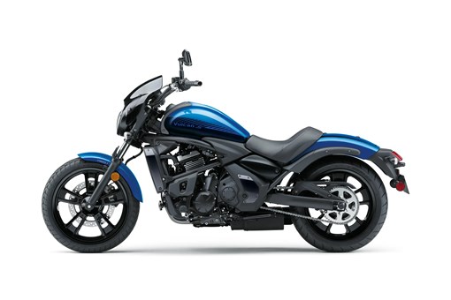 Profile angle of a motorcycle staged in a white studio background. opens in a new window