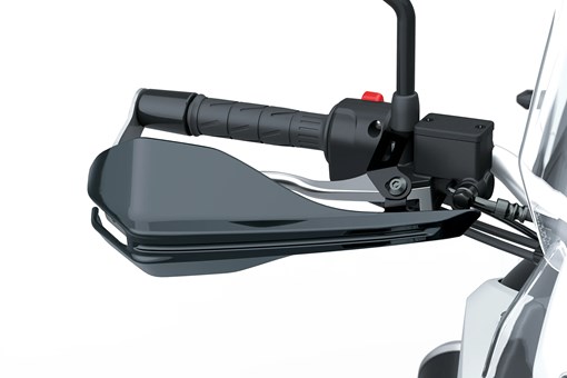 Single handlebar of a motorcycle staged in a white studio background. opens in a new window