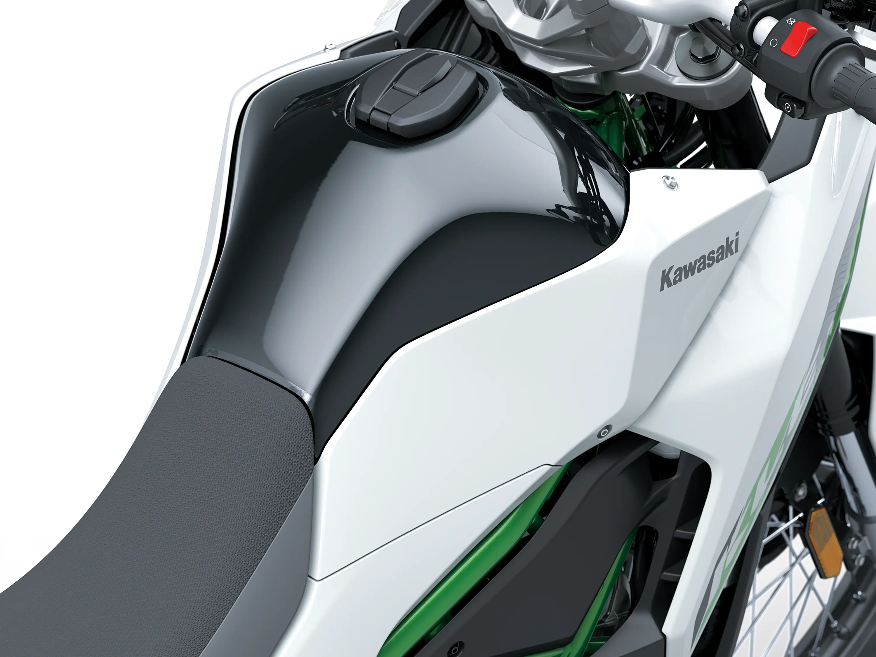 Closeup of tank of a motorcycle staged in a white studio background.