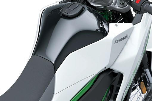 Closeup of tank of a motorcycle staged in a white studio background. opens in a new window