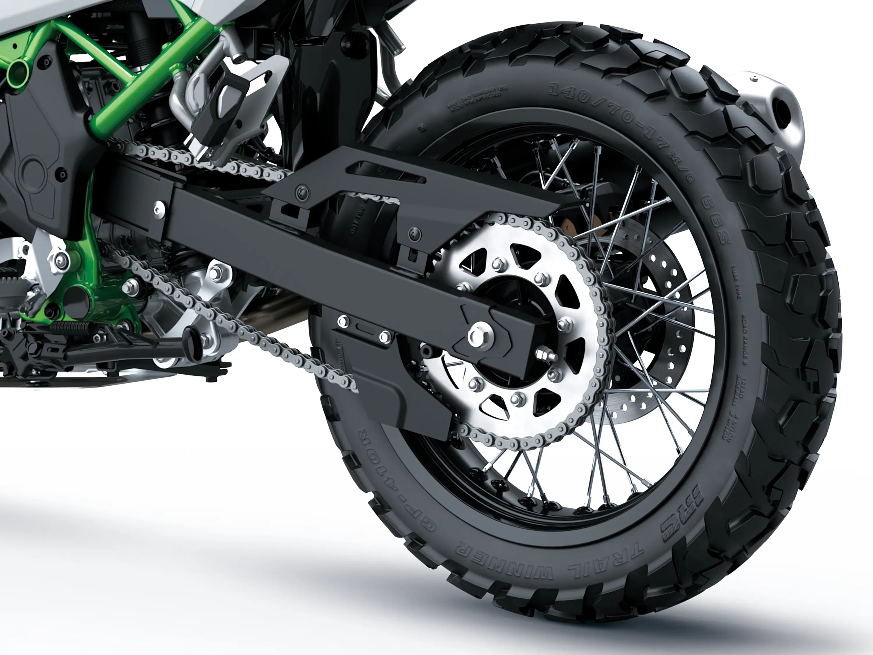 Closeup of a rear wheel of a motorcycle staged in a white studio background.