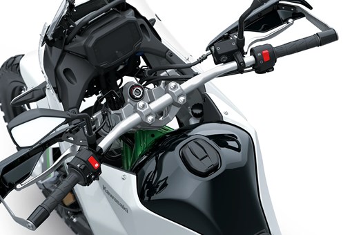 Handlebars of a motorcycle staged in a white studio background. opens in a new window