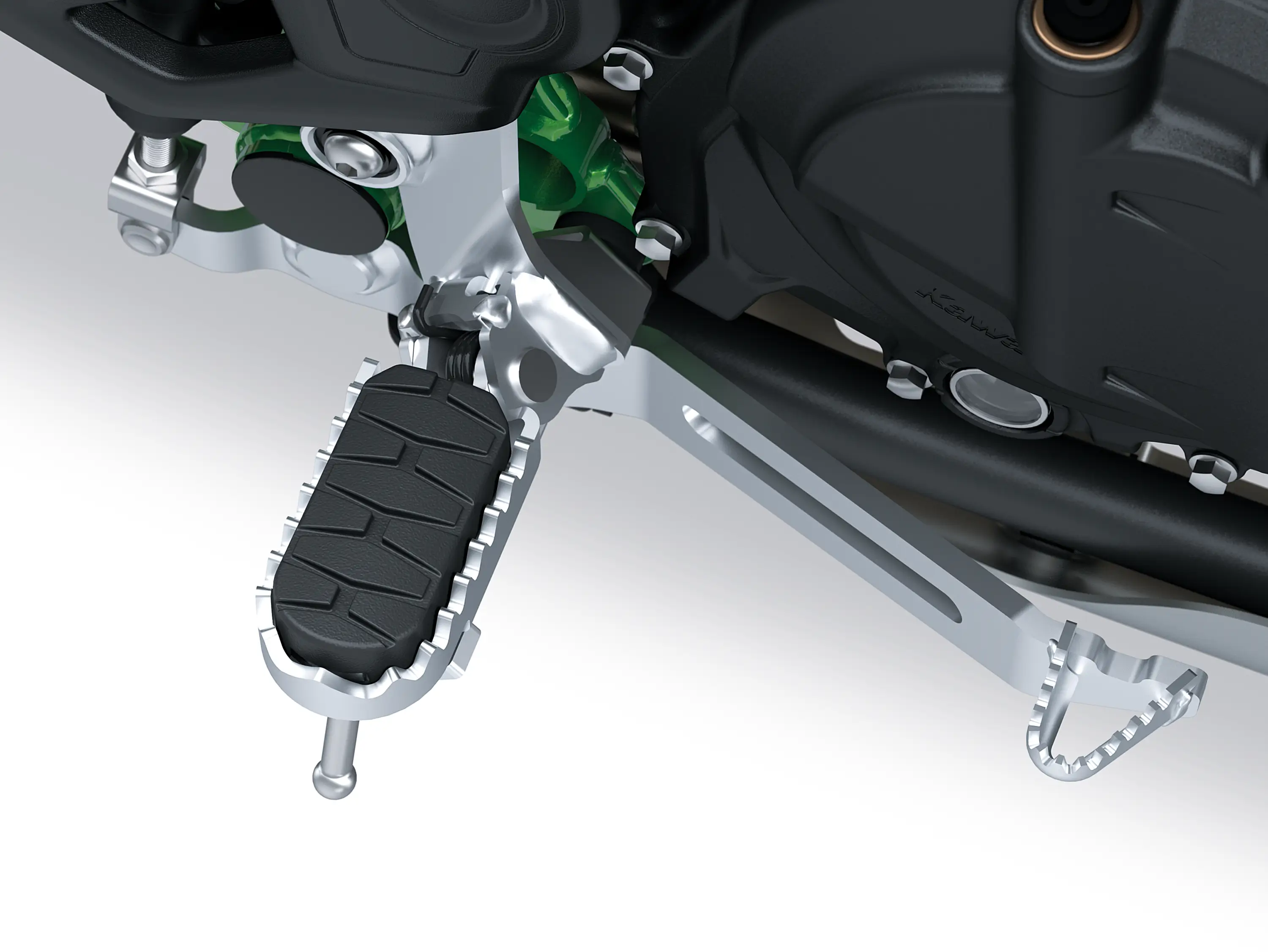 Foot peg of a motorcycle staged in a white studio background.