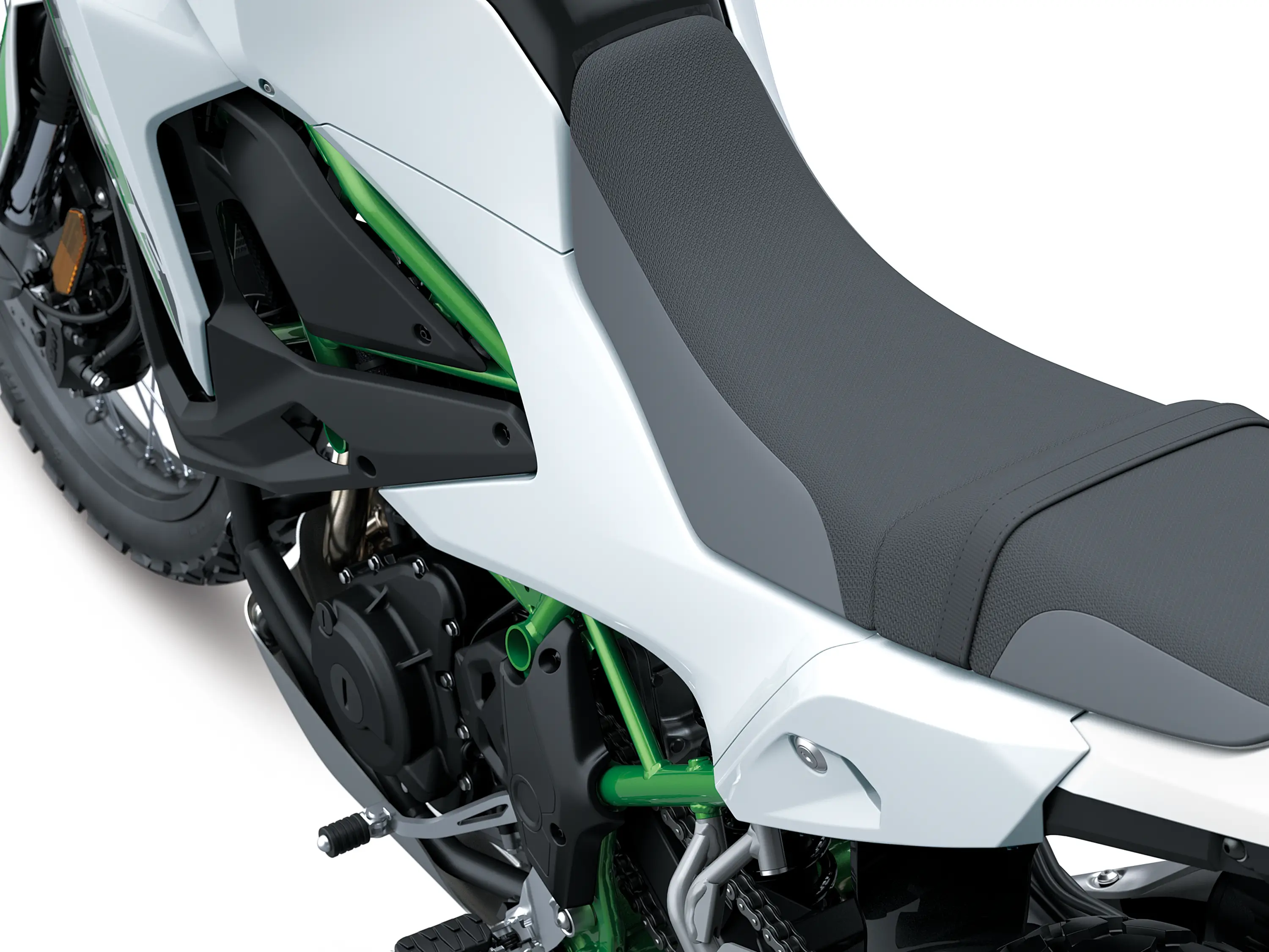 Closeup on seat of a motorcycle staged in a white studio background.