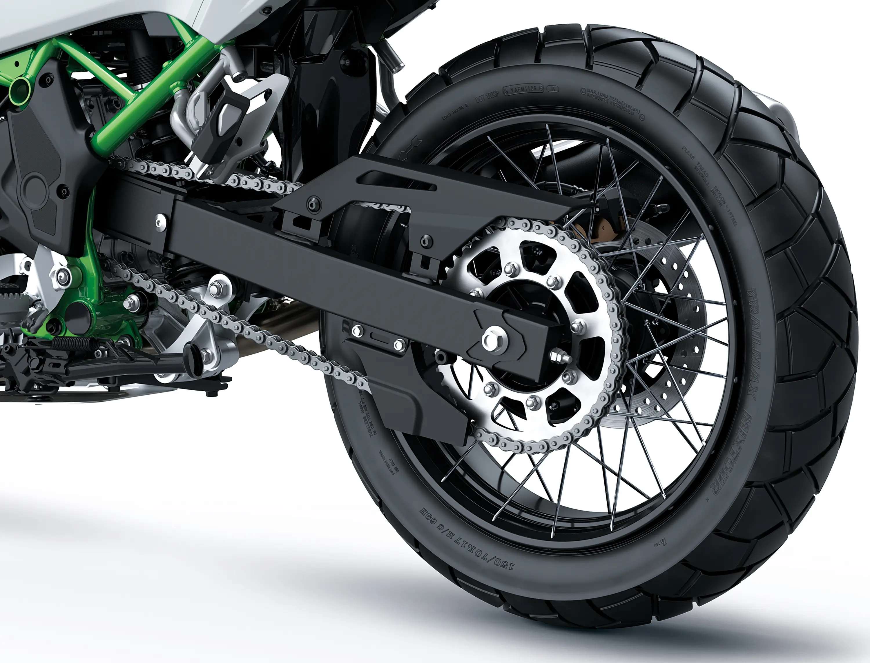 Closeup of a rear wheel of a motorcycle staged in a white studio background.
