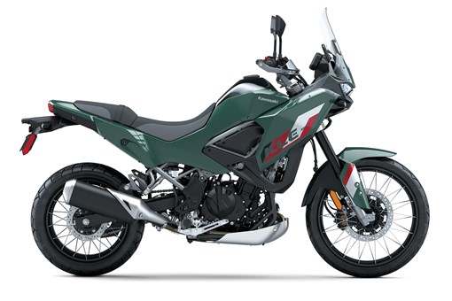 Profile angle of a gray/green motorcycle staged in a white studio background. opens in a new window