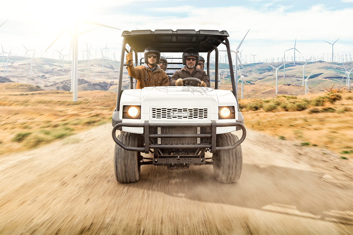 Front angle of a person driving a side x side off-road.