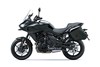 Side angle of a motorcycle staged in a white studio background.