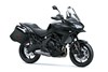 Profile angle of a motorcycle staged in a white studio background.
