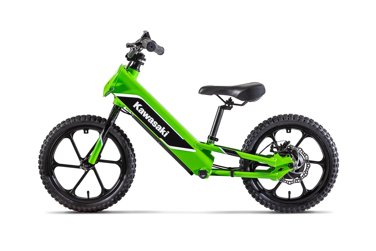 Profile angle of an electric balance bike staged in a white studio background.