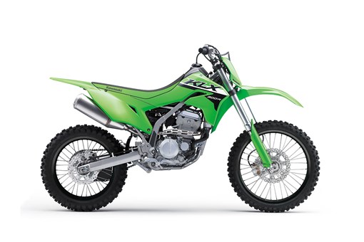 Profile angle of a green motorcycle staged in a white studio background. opens in a new window