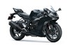 Three-quarter front angle of a motorcycle staged in a white studio background.
