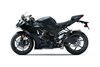 Side angle of a motorcycle staged in a white studio background.