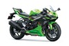 Three-quarter front angle of a motorcycle staged in a white studio background.