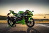 Profile angle of a motorcycle staged on a track.