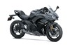 Three-quarter front angle of a motorcycle staged in a white studio background.