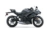 Side angle of a motorcycle staged in a white studio background.