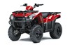 Three-quarter front angle of a red ATV staged in a white studio background.