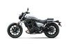 Side angle of a motorcycle staged in a white studio background.