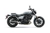 Profile angle of a motorcycle staged in a white studio background.