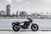 Profile angle of a motorcycle in a city.