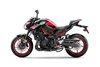 Side angle of a motorcycle staged in a white studio background.